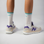 Clay Active tennis socks with New Balance shoes.