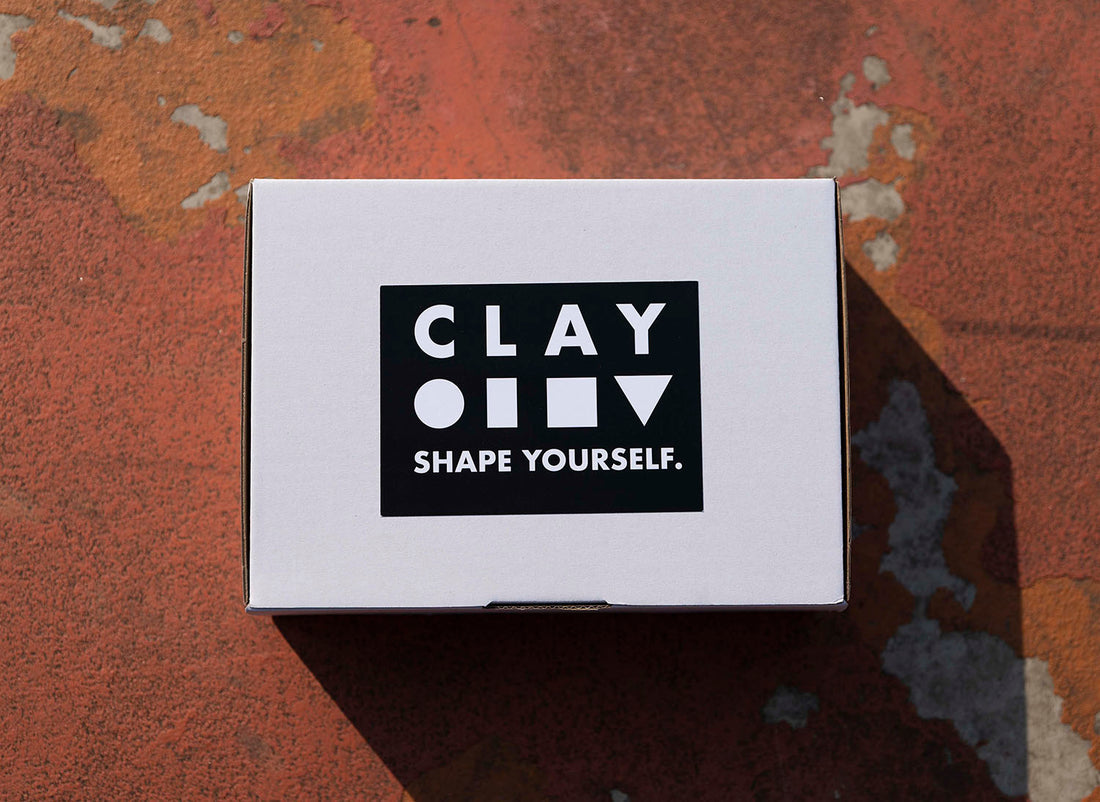 Clay Active boxset with shapes logo and shape yourself slogan. Clay Active's shape yourself boxset contains five high quality sport socks made for athletes and designed for style. 