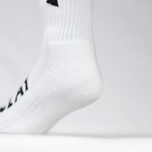 Close up of cushioning for Clay Active's men's white athletic socks.