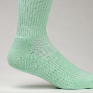 Clay Active men's athletic crew socks showing side view in studio.