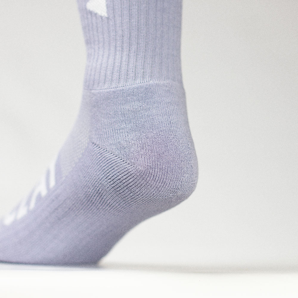 Clay Active men's athletic sock close up in studio.
