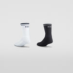Clay Active black and white men's tennis socks 2 pairs old school set in studio, angle.